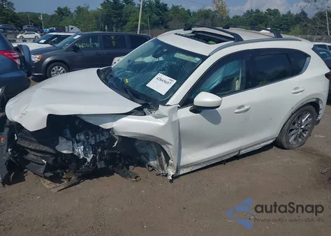 2021 Mazda Cx-5 Grand Touring z USA, uszkodzony, nr VIN JM3KFBDM5M0317866